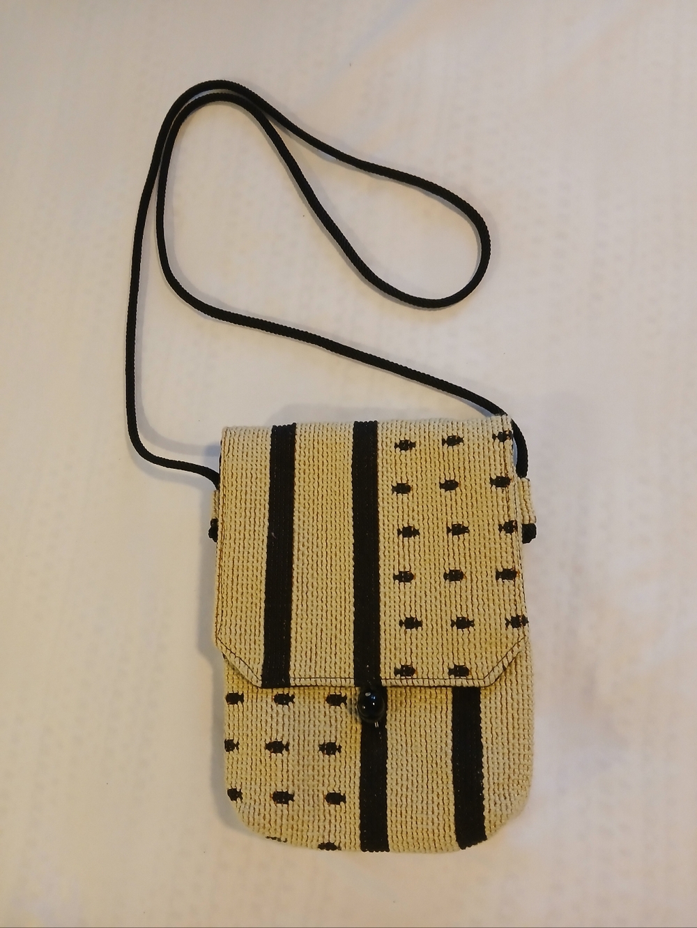 Woven Straw Crossbody Bag with Black Stripe and Dot Detail